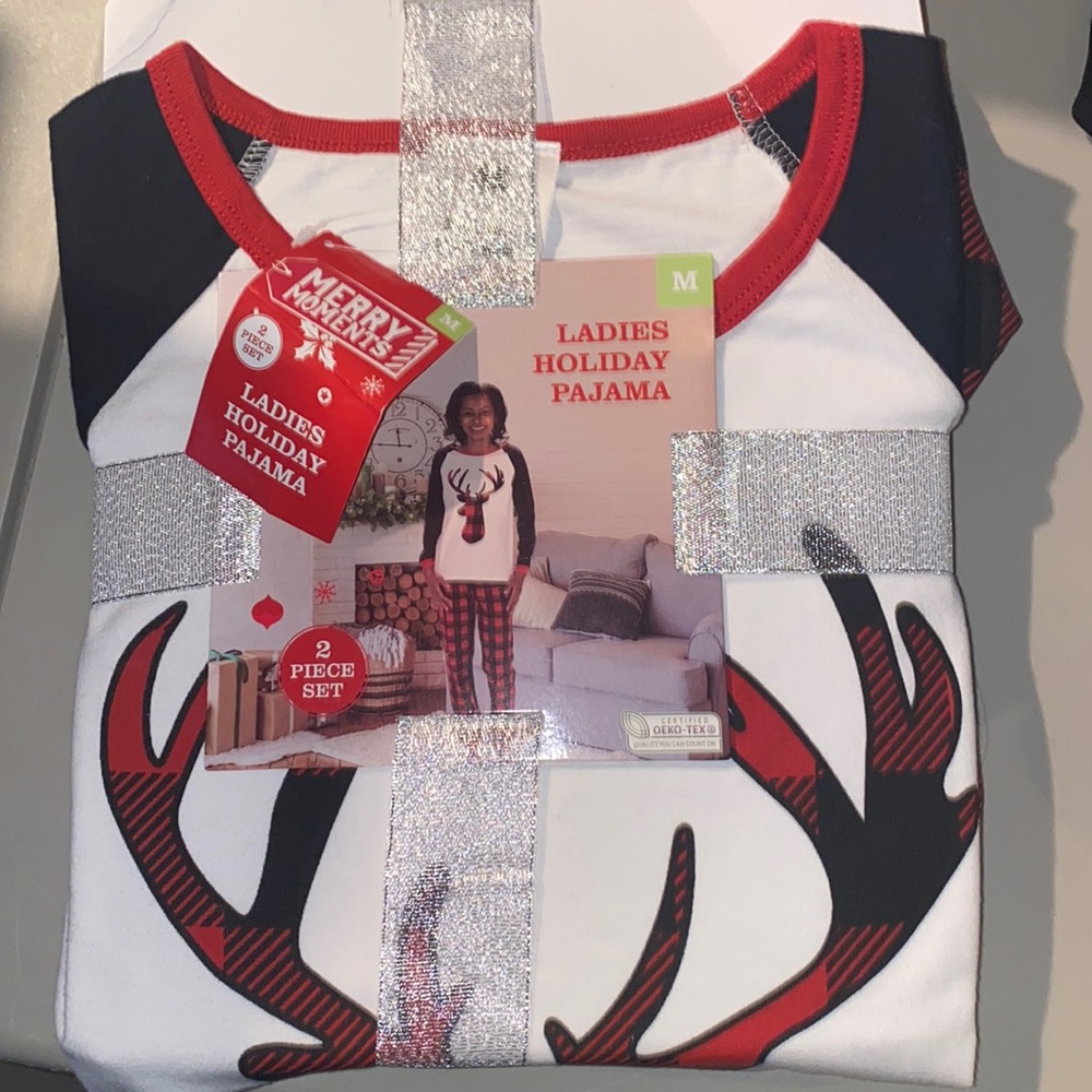 **brand new. Christmas pajama sets.